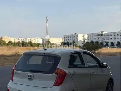Kia Picanto 2015 — صورة 2